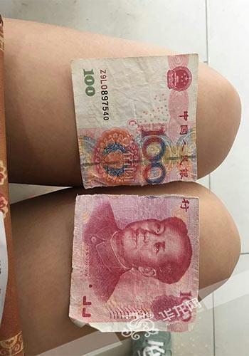 司机怒撕乘客百元钞票